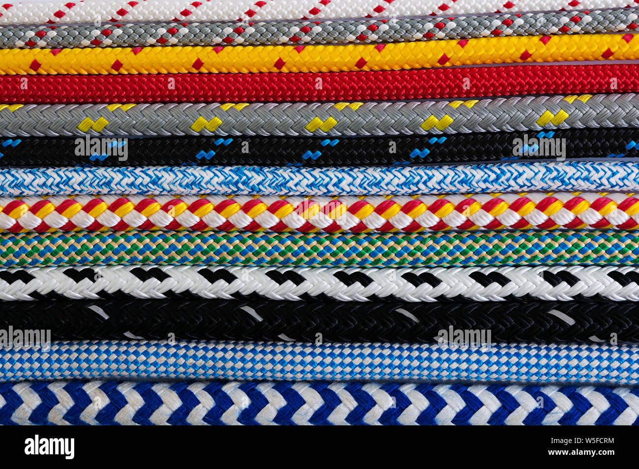 Colorful Rope Background Colorful ropes. Background of ropes Stock Photo - Alamy