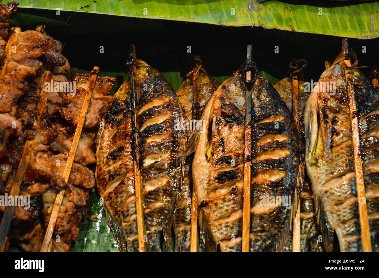 The famous Luang Prabang morning market of Laos that showcases authentic local Laotian food and exotic dishes Stock Photo