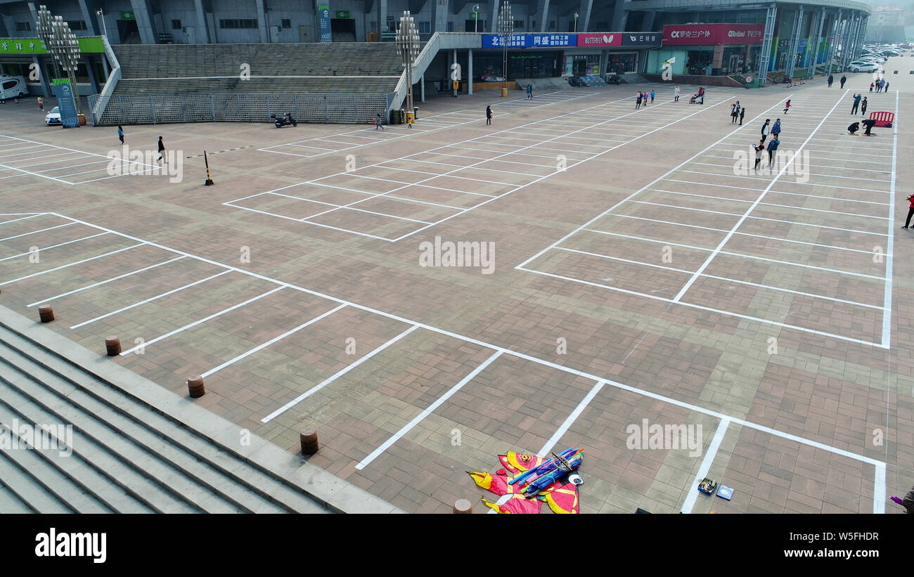 Aerial view of a parking lot transformed from a "washboard road" with
