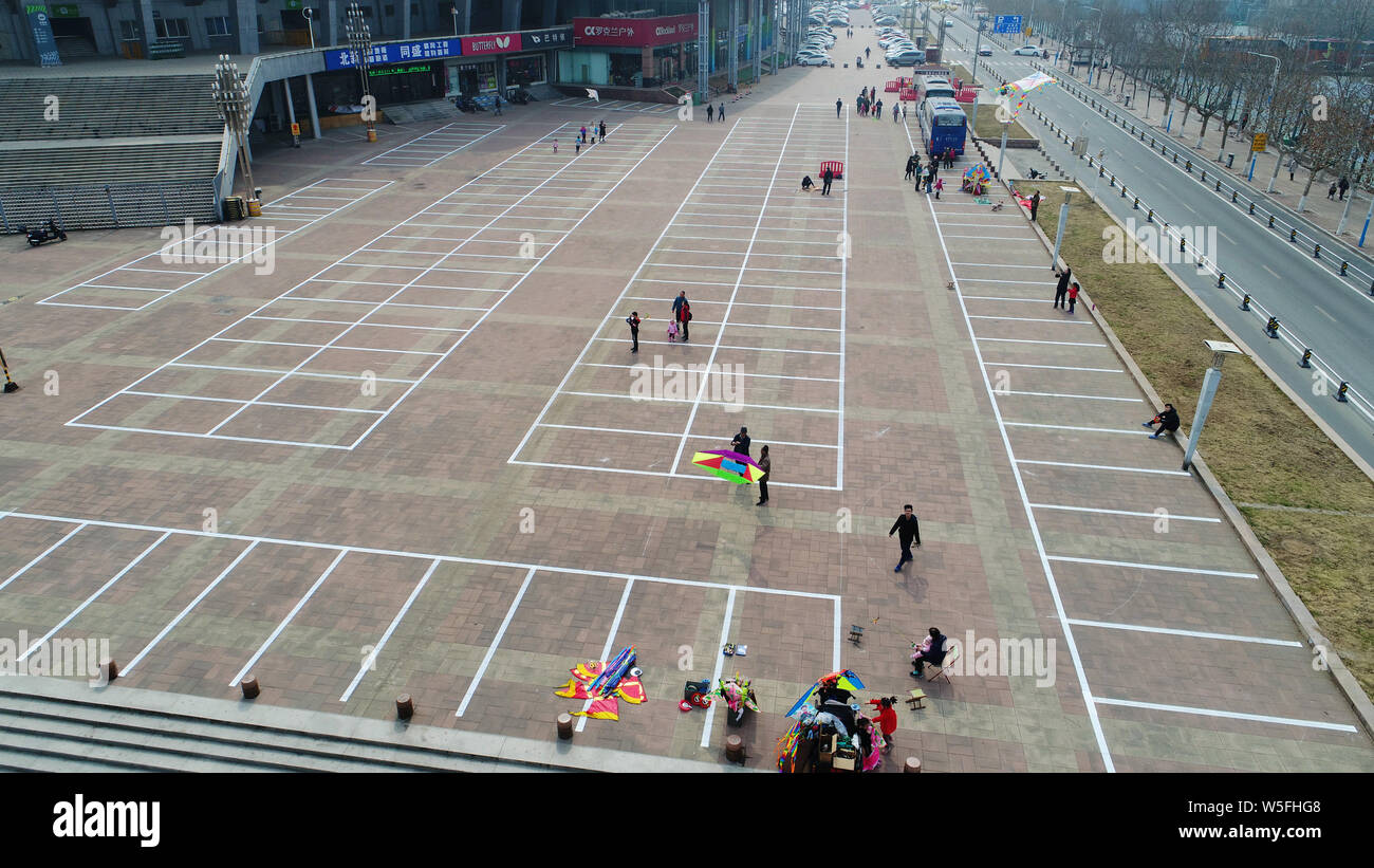 Aerial view of a parking lot transformed from a "washboard road" with