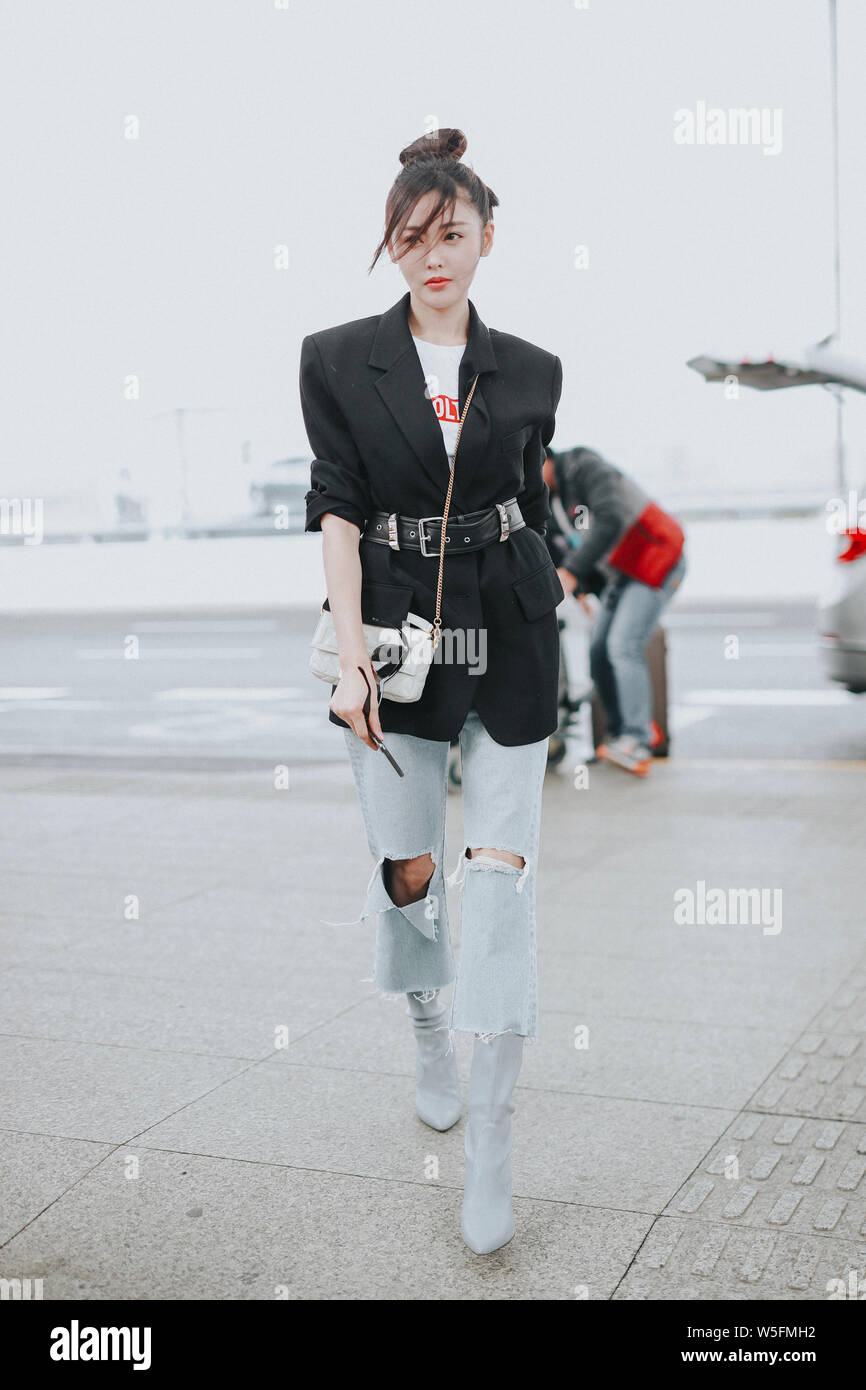 Chinese actress Crystal Zhang or Zhang Tianai arrives at an airport in  Shanghai, China, 6 March 2019. Suit: Alexander Wang Bag: Fendi Shoes: Stuar  Stock Photo - Alamy