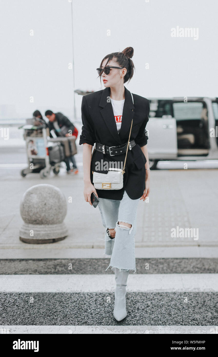 Chinese actress Crystal Zhang or Zhang Tianai arrives at an airport in