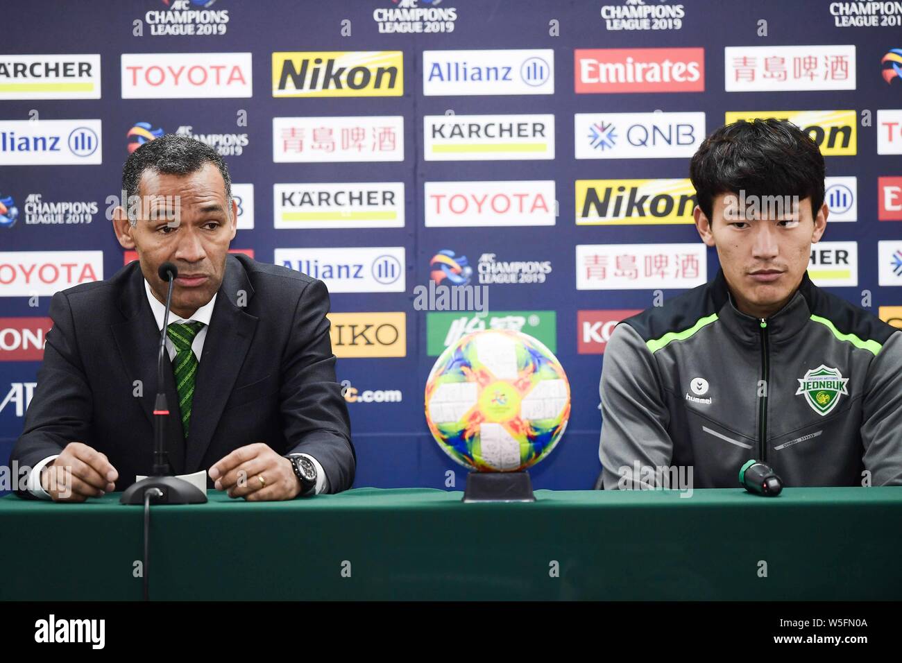 Head Coach Jose Morais Left And Han Kyo Won Of Jeonbuk Hyundai Motors F C Attend A Press Conference After The Group G Match Between China S Beijing Stock Photo Alamy