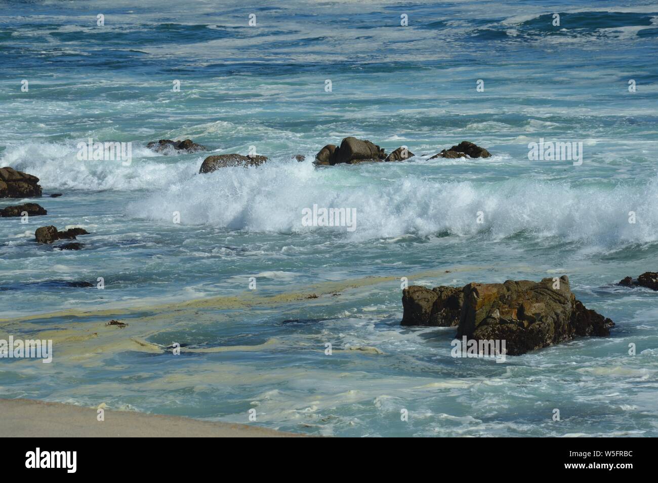 mighty waves dashing on thshore of the coast of Southern California Stock Photo