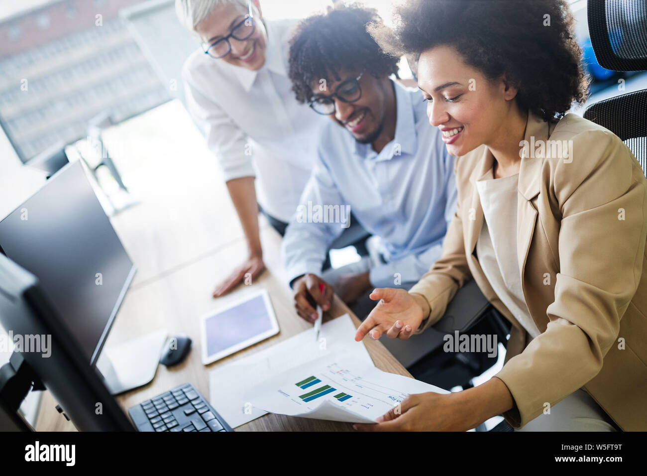 Successful business group of people at work in office Stock Photo - Alamy
