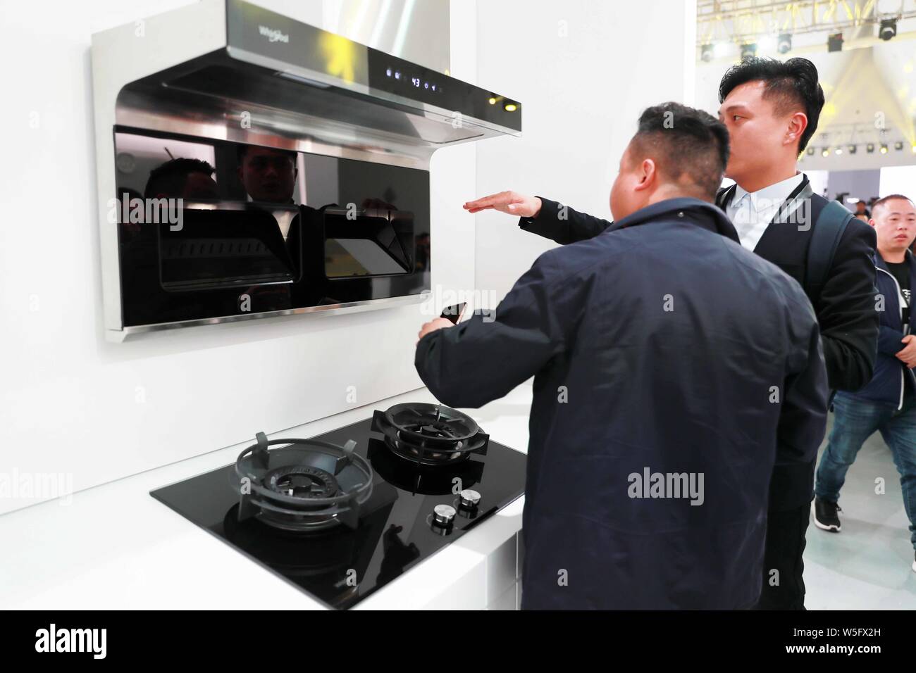 People visit the Whirlpool new product launch conference at the