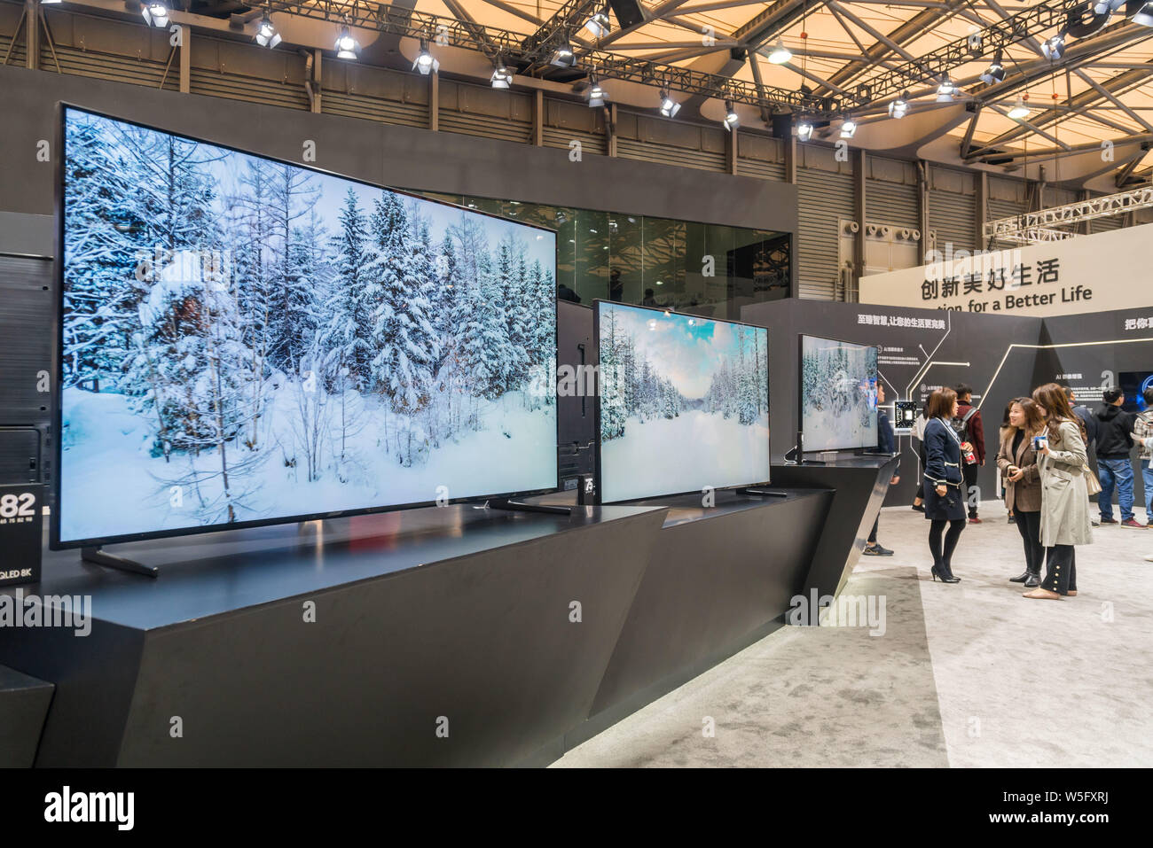 Samsung 8K QLED TVs are on display during the Appliance & Electronics World Expo 2019 (AWE 2019) in Shanghai, China, 14 March 2019. Stock Photo