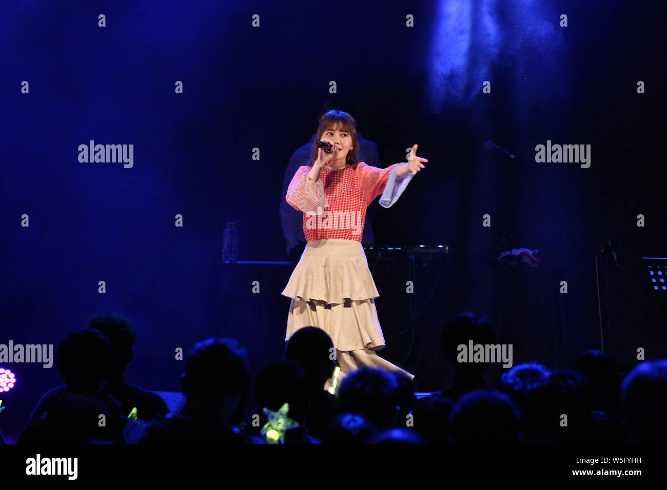 Japanese singer-songwriter Maco performs during the 