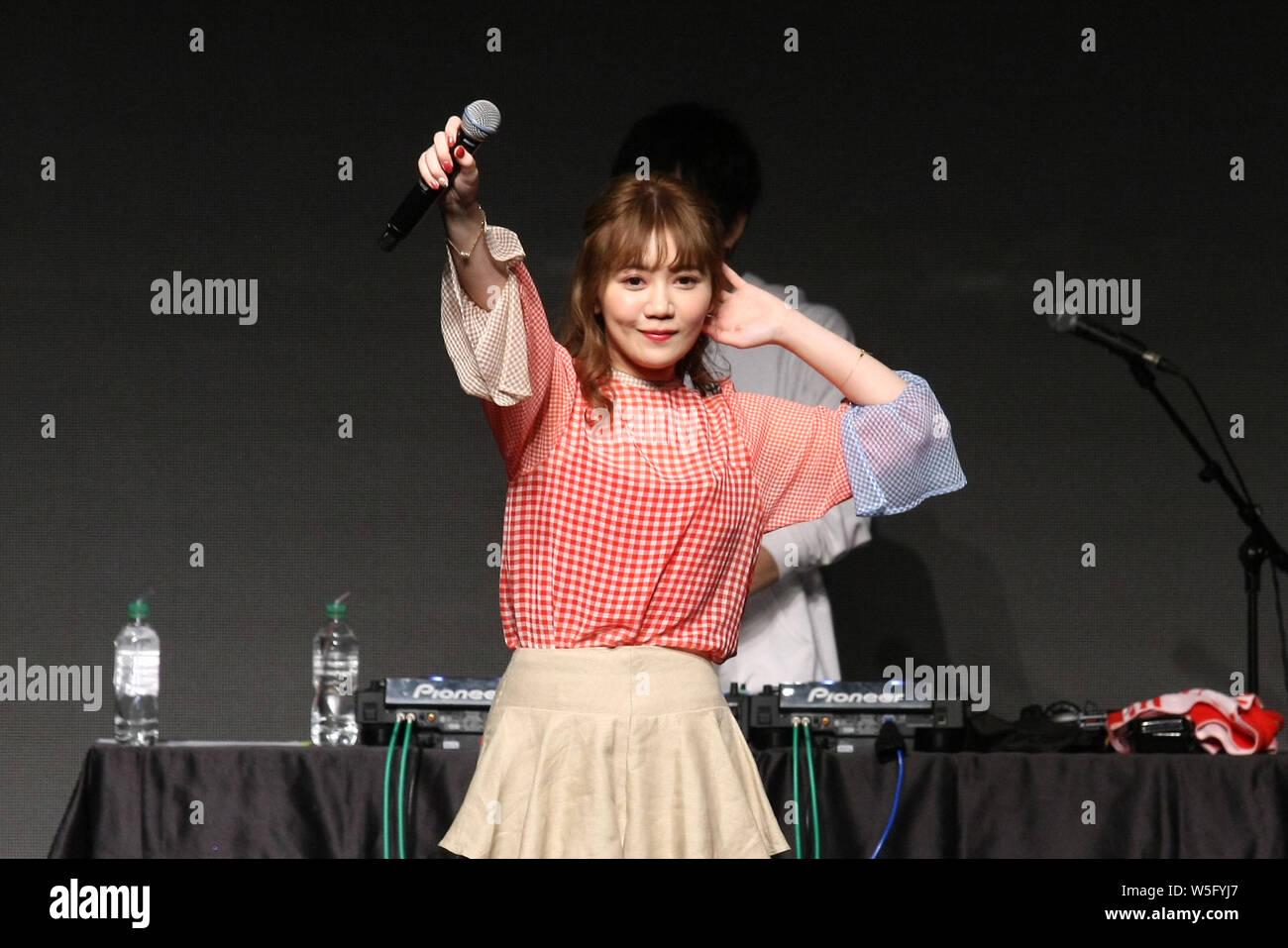 Japanese singer-songwriter Maco performs during the 