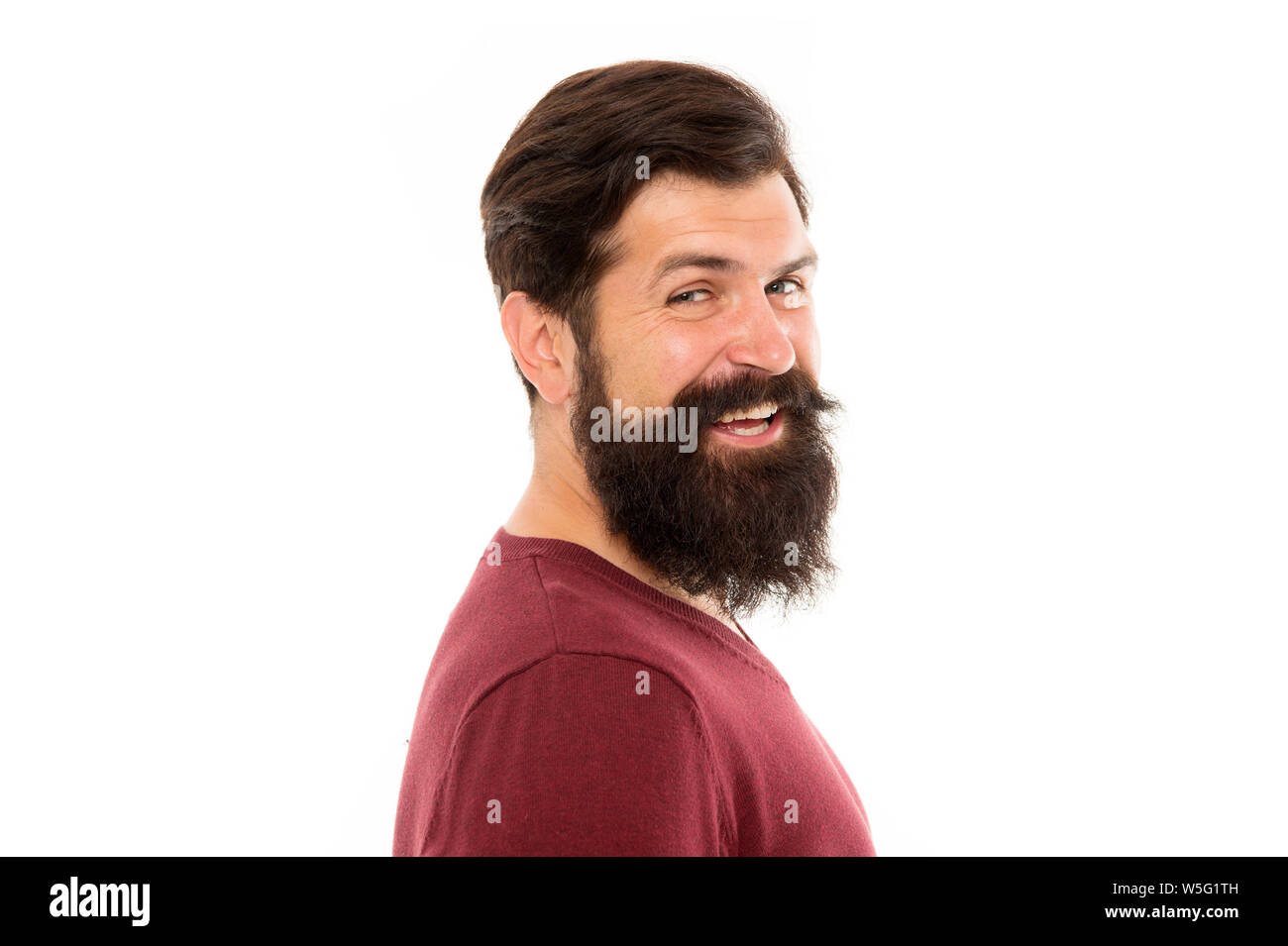 Simply required to not shave. Beard hairs grow at different rates. Man with long beard and