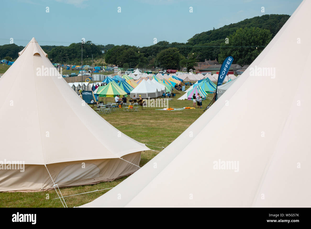 Large high end glamping tents, at an outdoor festival UK Stock Photo