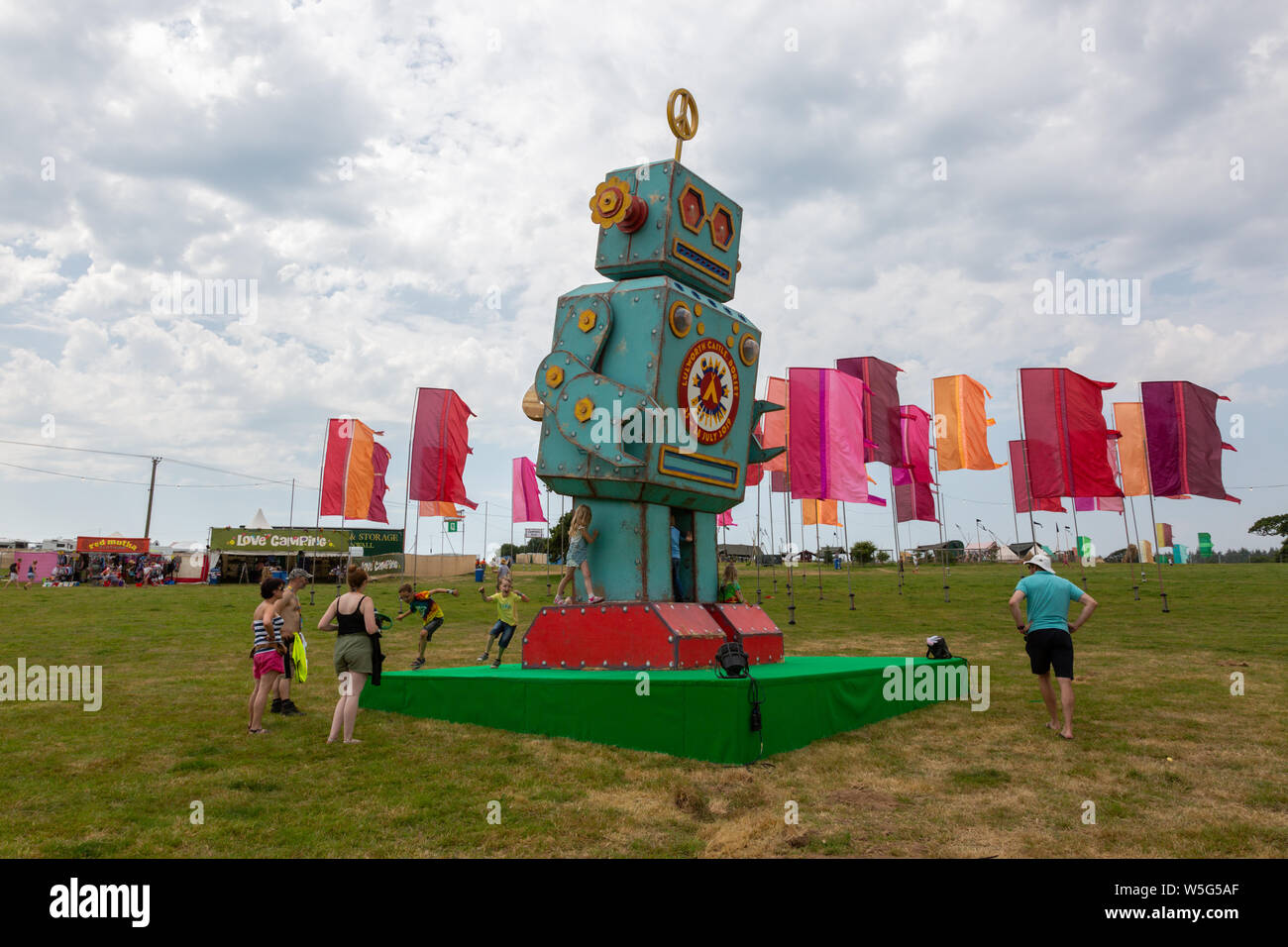 Large model robot structure with chidren playing, Camp Bestival, UK 2019 Stock Photo