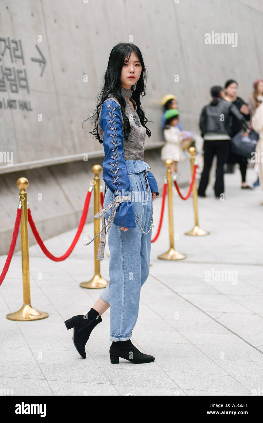 A trendy woman in fashionable outfit is pictured on the street during the  2019 Fall/Winter Seoul Fashion Week in Seoul, South Korea, 21 March 2019  Stock Photo - Alamy