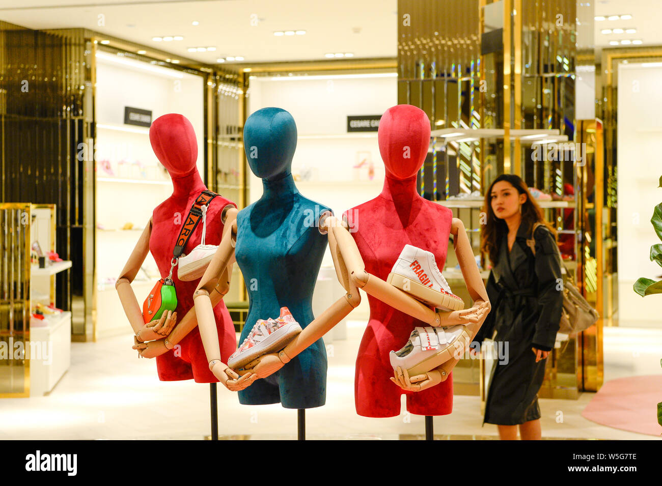 Customers shop at the newest flagship store of Frenchbased highend