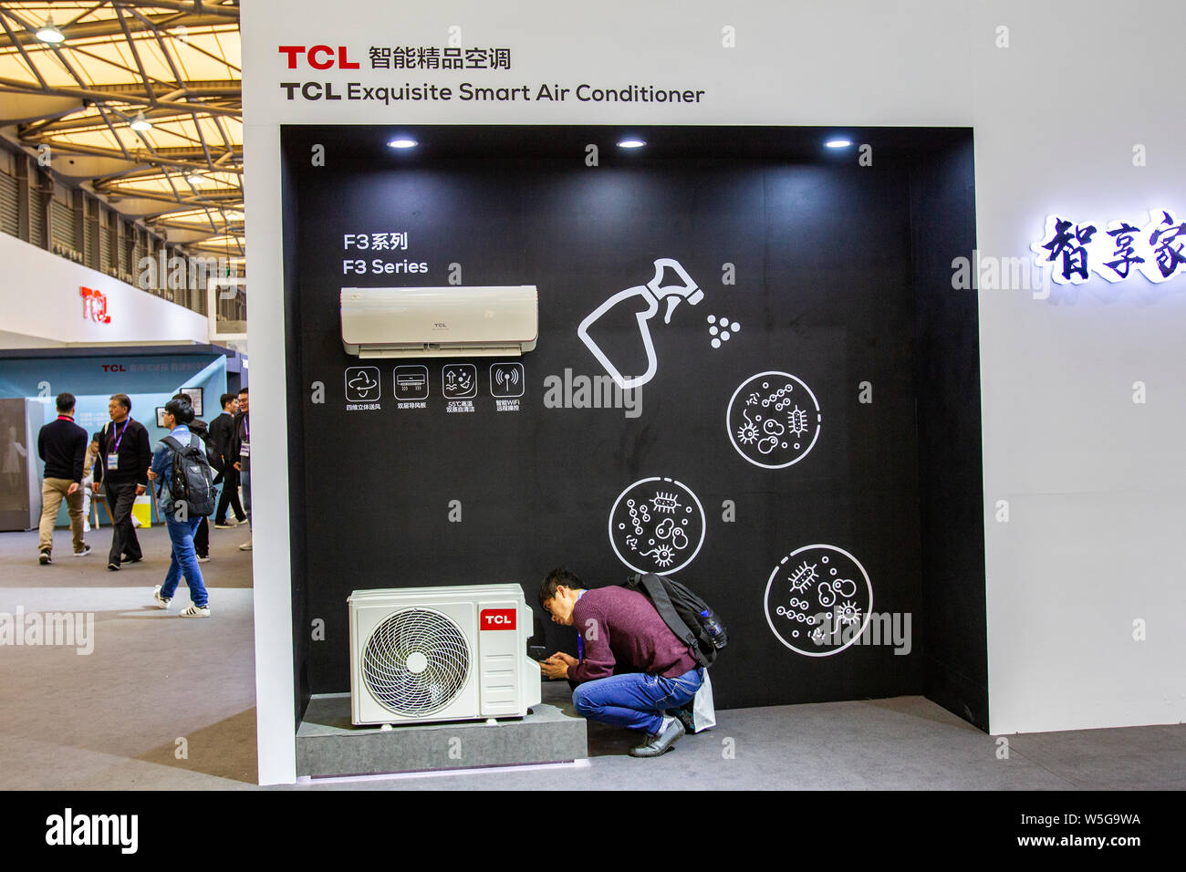 --FILE--People visit the stand of China's leading home appliance manufacturer TCL Corporation during the Appliance & Electronics World Expo 2019 (AWE Stock Photo