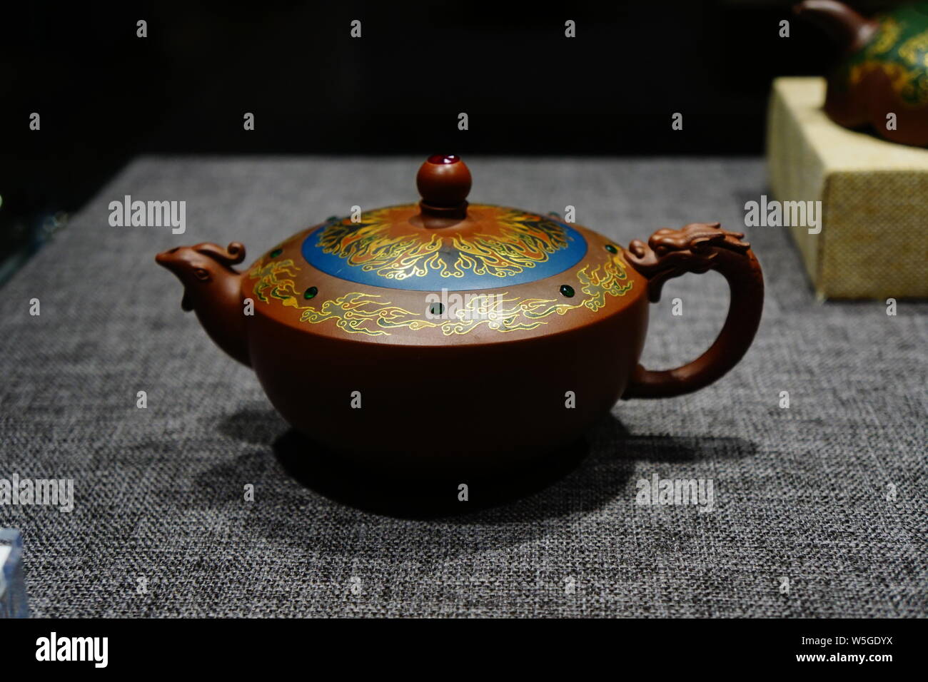 Purple clay teapot works are on display at the "Capitals Lingering Charm, Yishun Ji's Purple Sand Exhibition" in Beijing, China, 28 March 2019.   The Stock Photo