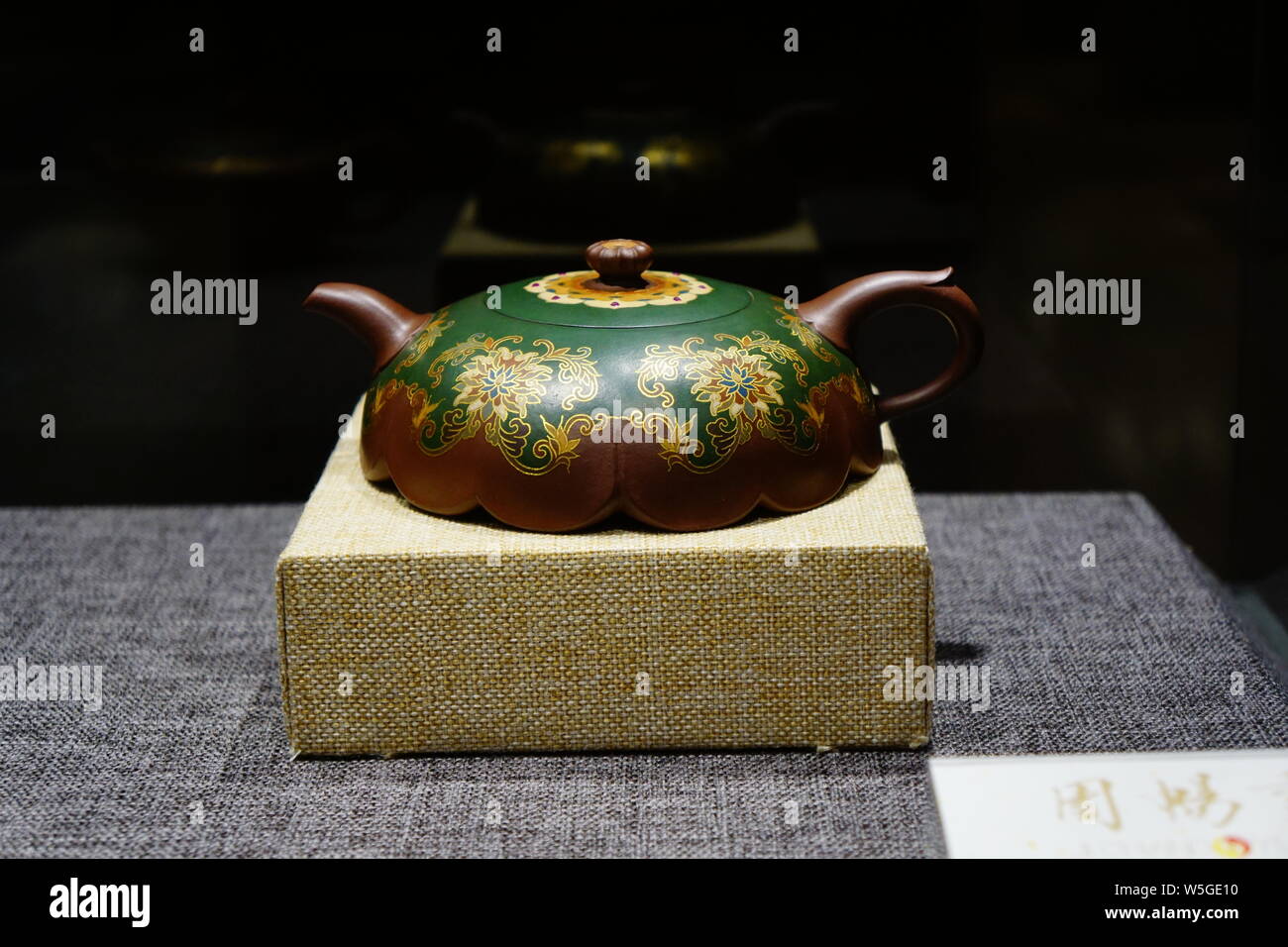 Purple clay teapot works are on display at the "Capitals Lingering