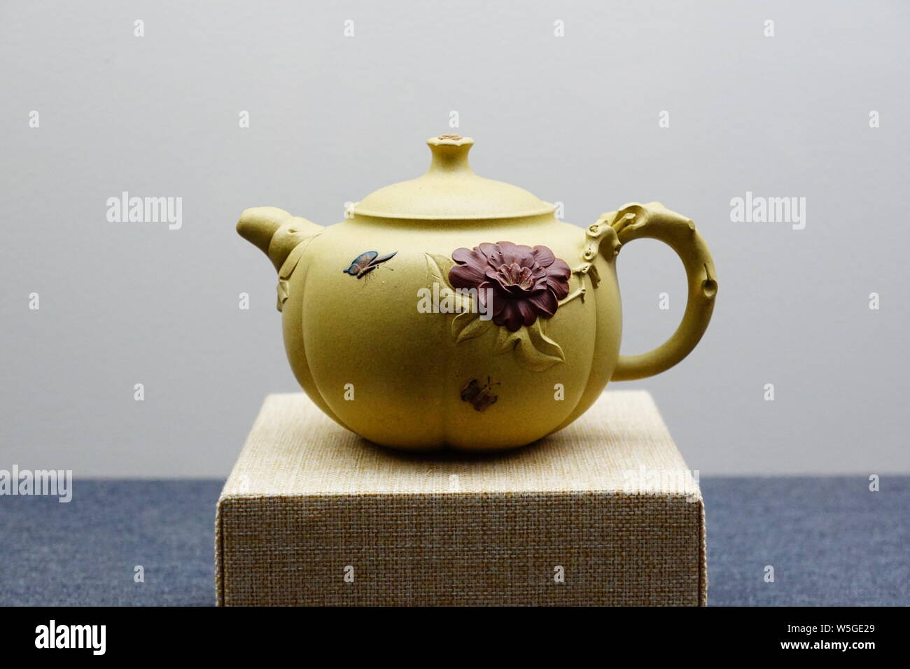 Purple clay teapot works are on display at the "Capitals Lingering