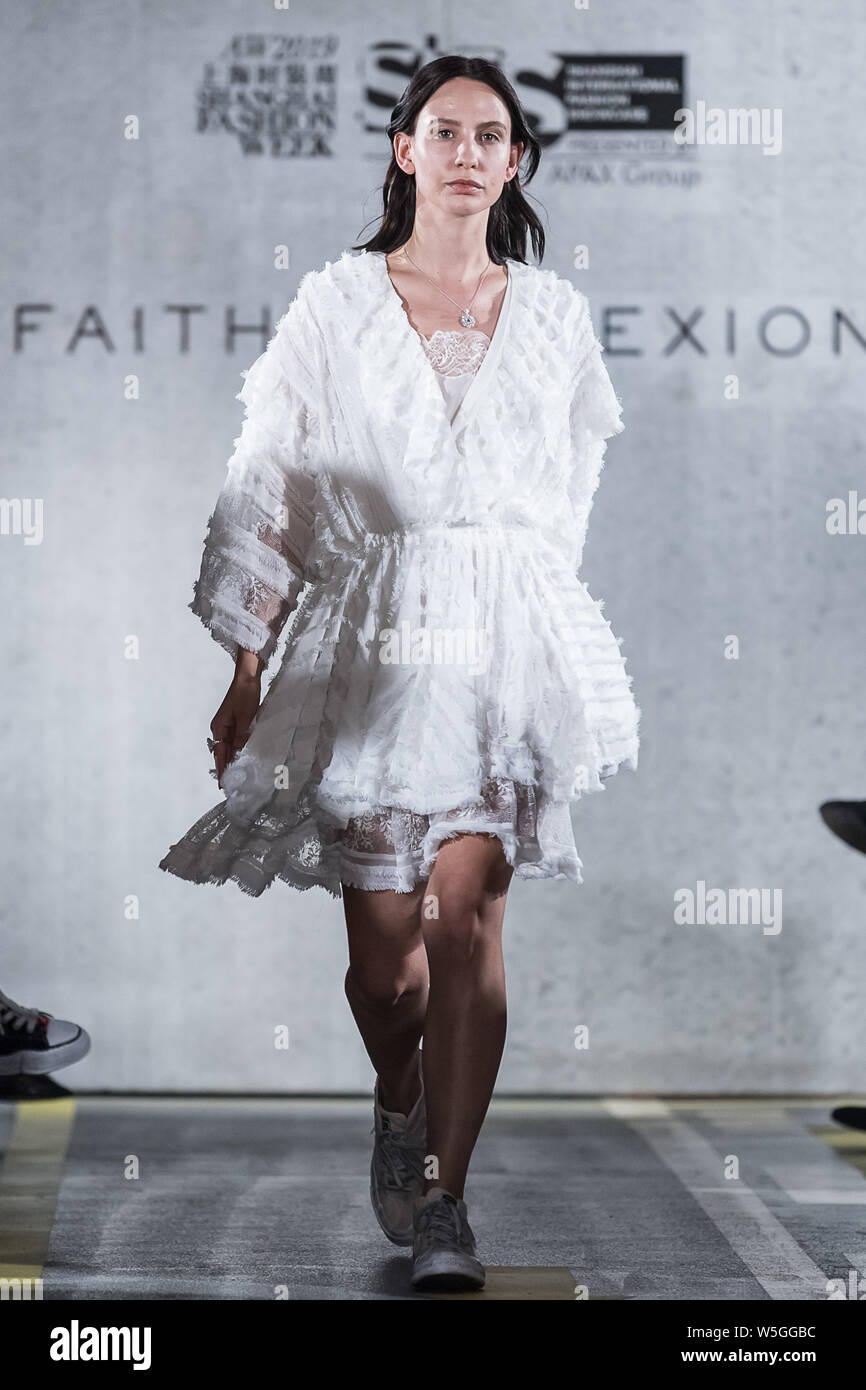 A model displays a new creation at the Faith Connexion show during the Shanghai Fashion Week Fall/Winter 2019 in Shanghai, China, 29 March 2019. Stock Photo