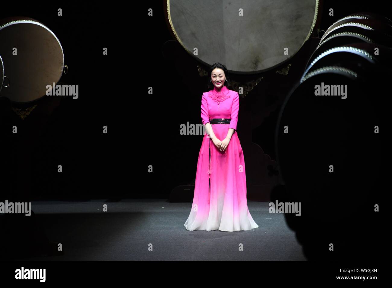 Chinese fashion designer Xiong Ying poses at the fashion show of Heaven Gaia by Xiong Ying during the China Fashion Week Fall/Winter 2019 in Beijing, Stock Photo