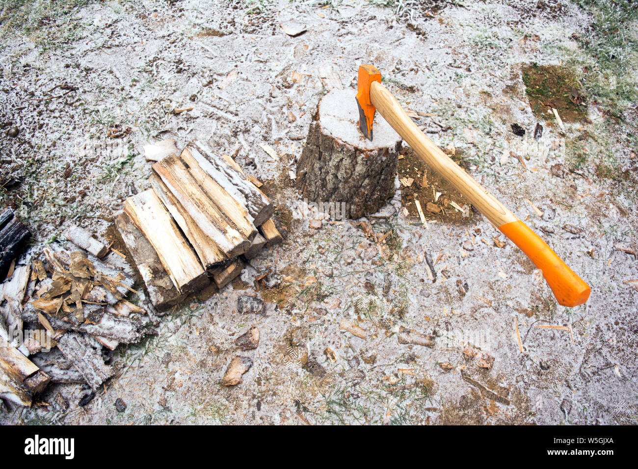 Axe stuck in log hi-res stock photography and images - Alamy