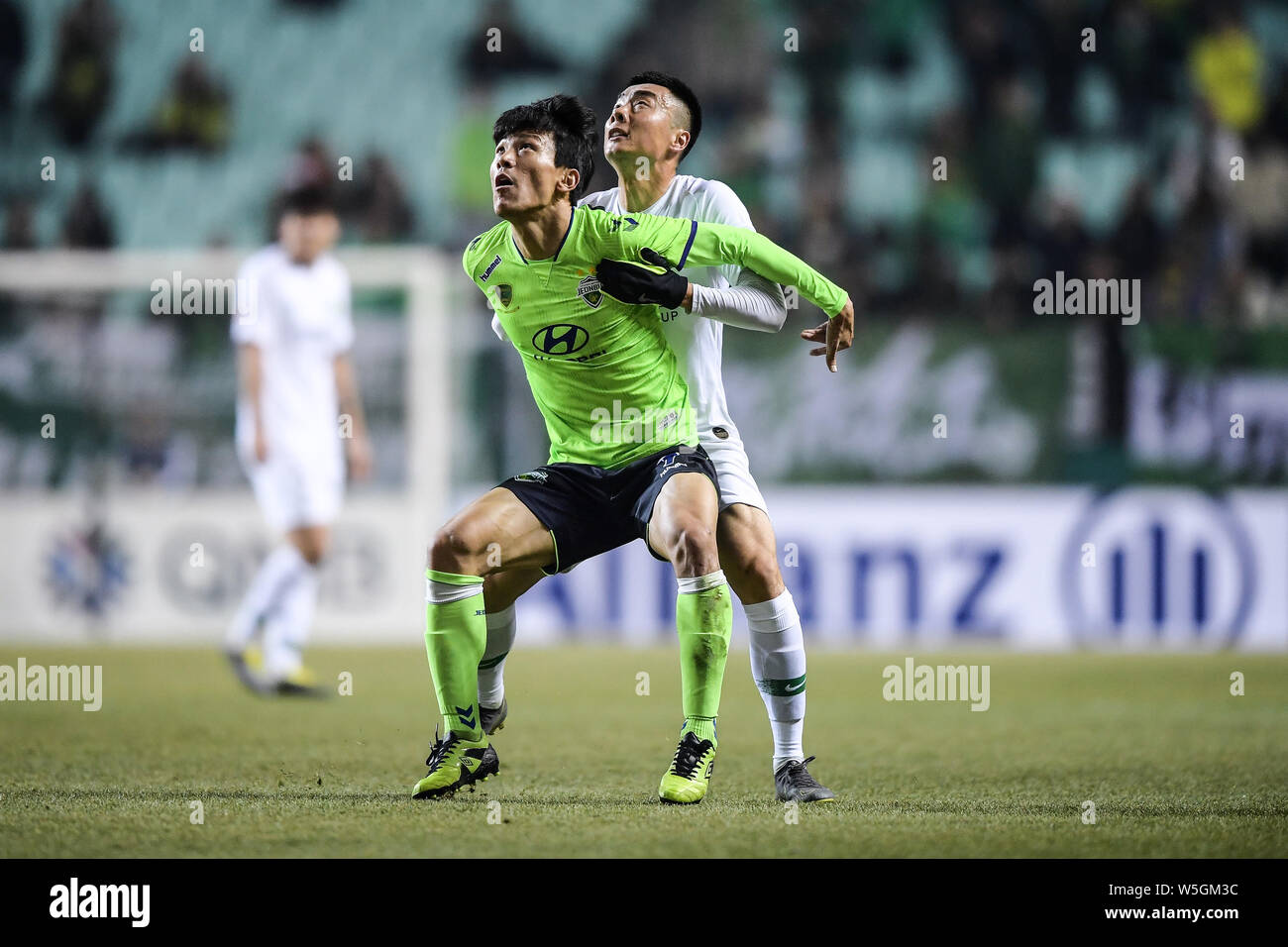 Han Kyo Won Front Of South Korea S Jeonbuk Hyundai Motors F C Challenges Li Lei Of China S Beijing Sinobo Guoan F C In Their Group G Match During Stock Photo Alamy