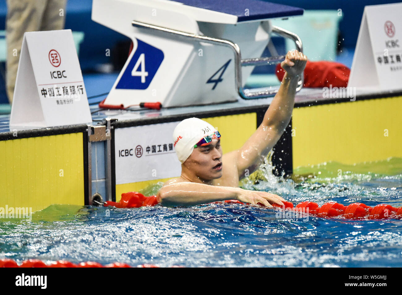 Chinese swimming Olympic champion Sun Yang reacts after winning the men ...