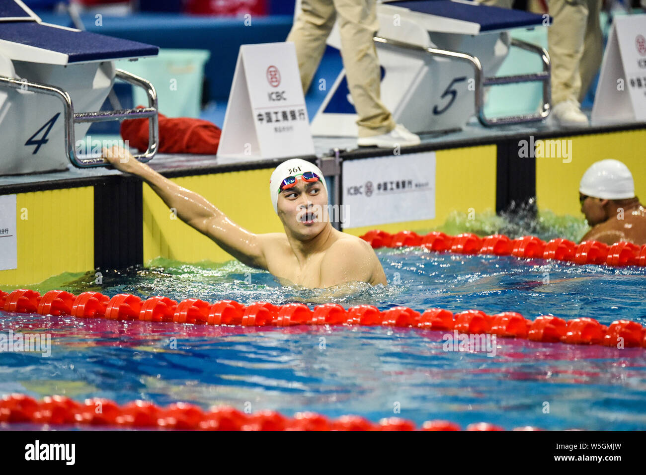 Chinese swimming Olympic champion Sun Yang reacts after winning the men ...
