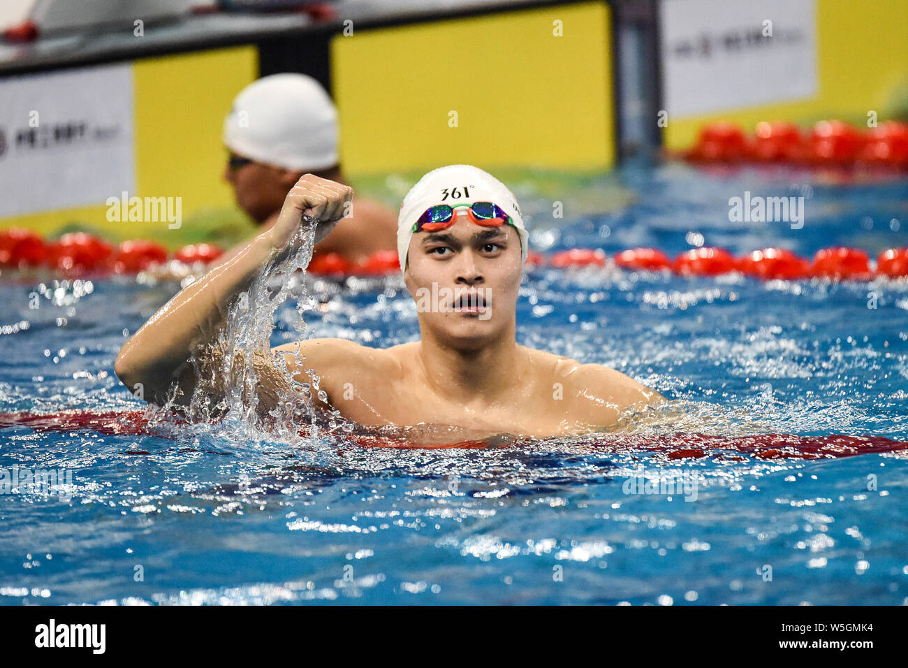 Chinese swimming Olympic champion Sun Yang reacts after winning the men ...