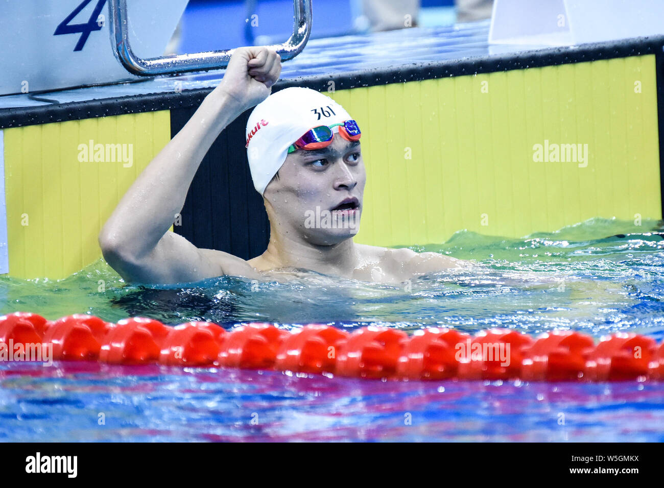 Chinese swimming Olympic champion Sun Yang reacts after winning the men ...