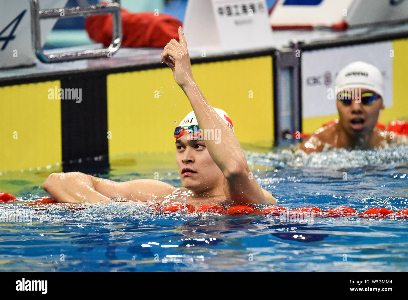 Chinese swimming Olympic champion Sun Yang reacts after winning the men ...