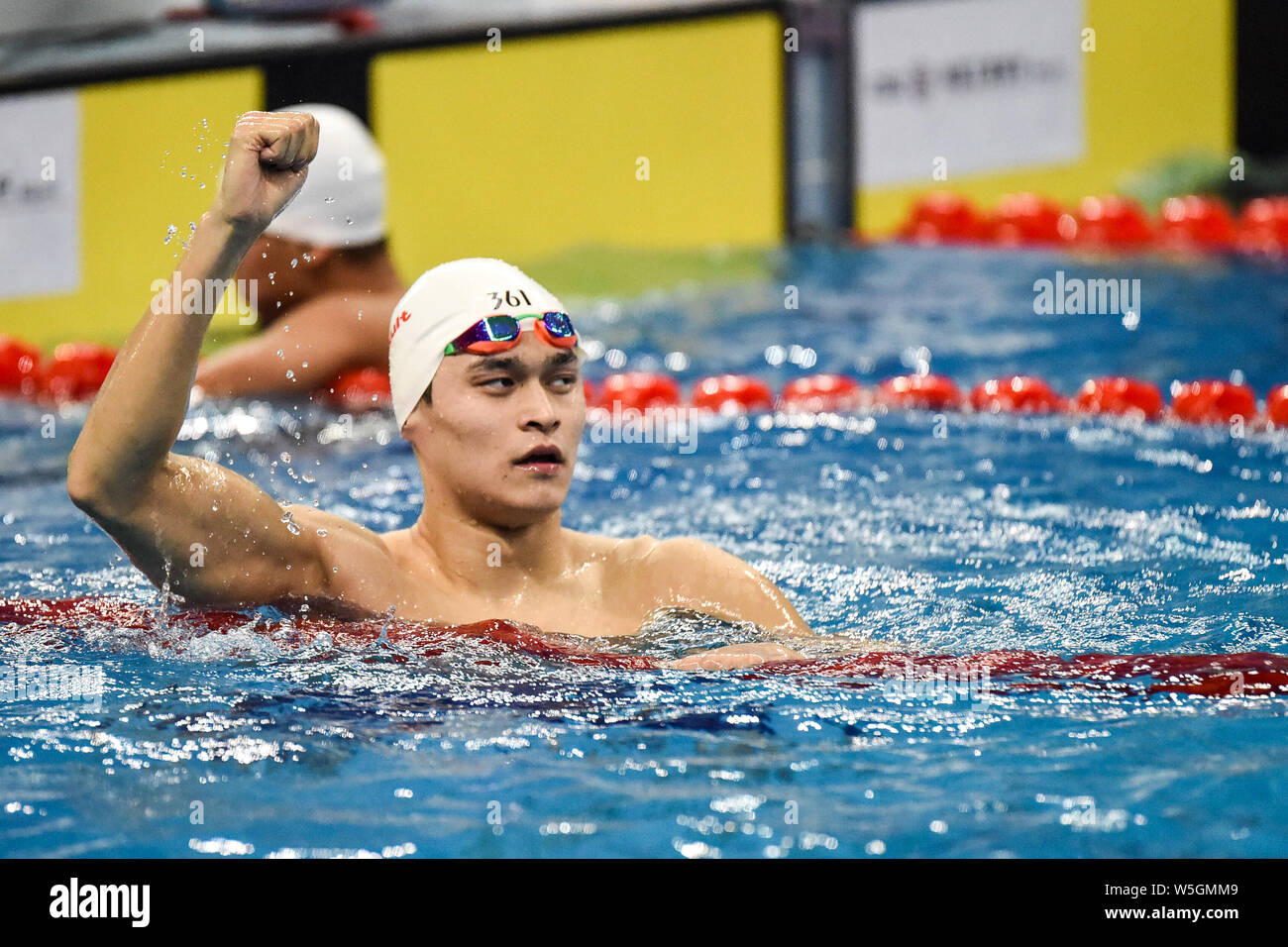 Chinese swimming Olympic champion Sun Yang reacts after winning the men ...