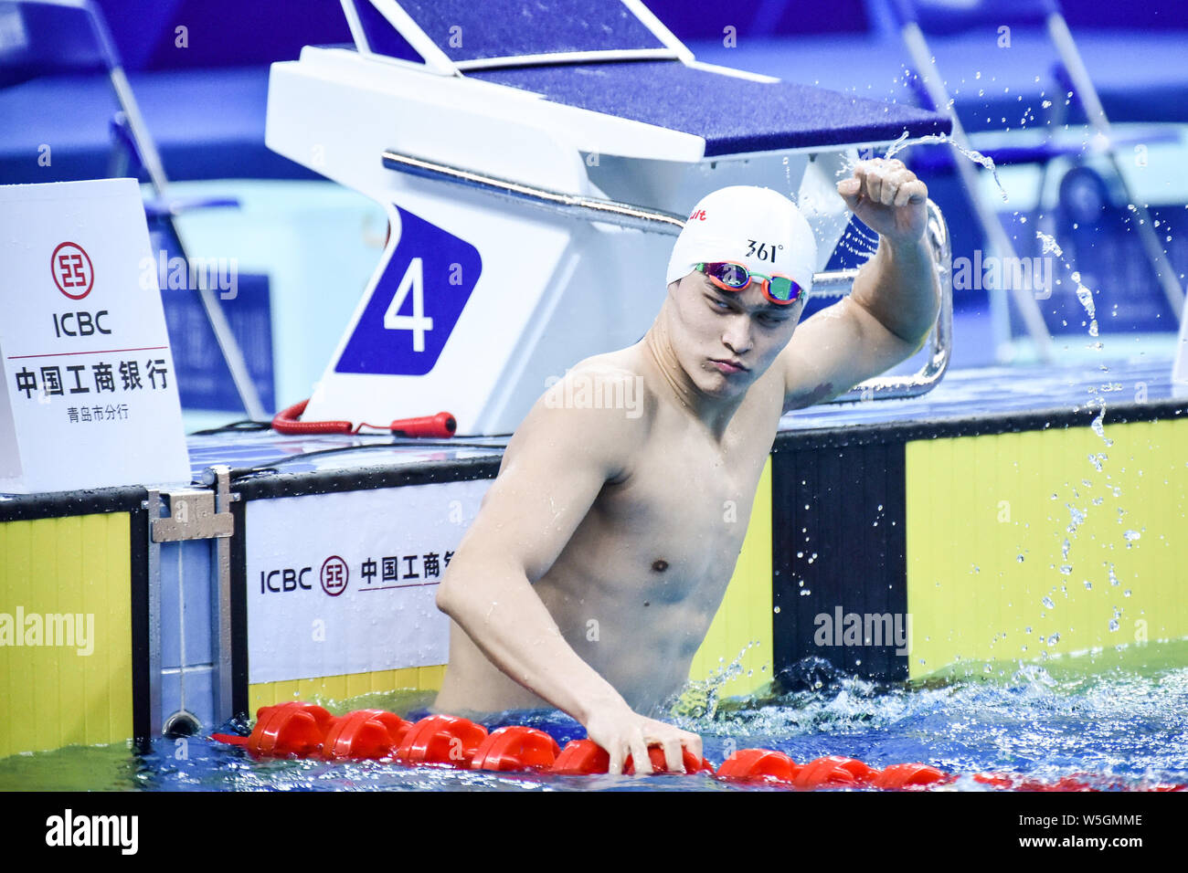 Chinese swimming Olympic champion Sun Yang reacts after winning the men ...