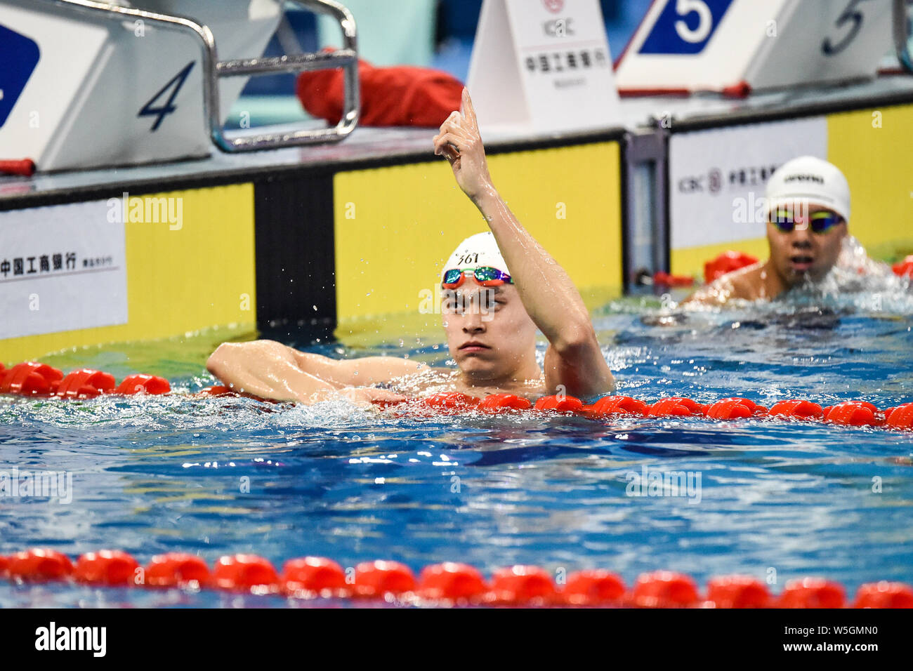 Chinese swimming Olympic champion Sun Yang reacts after winning the men ...