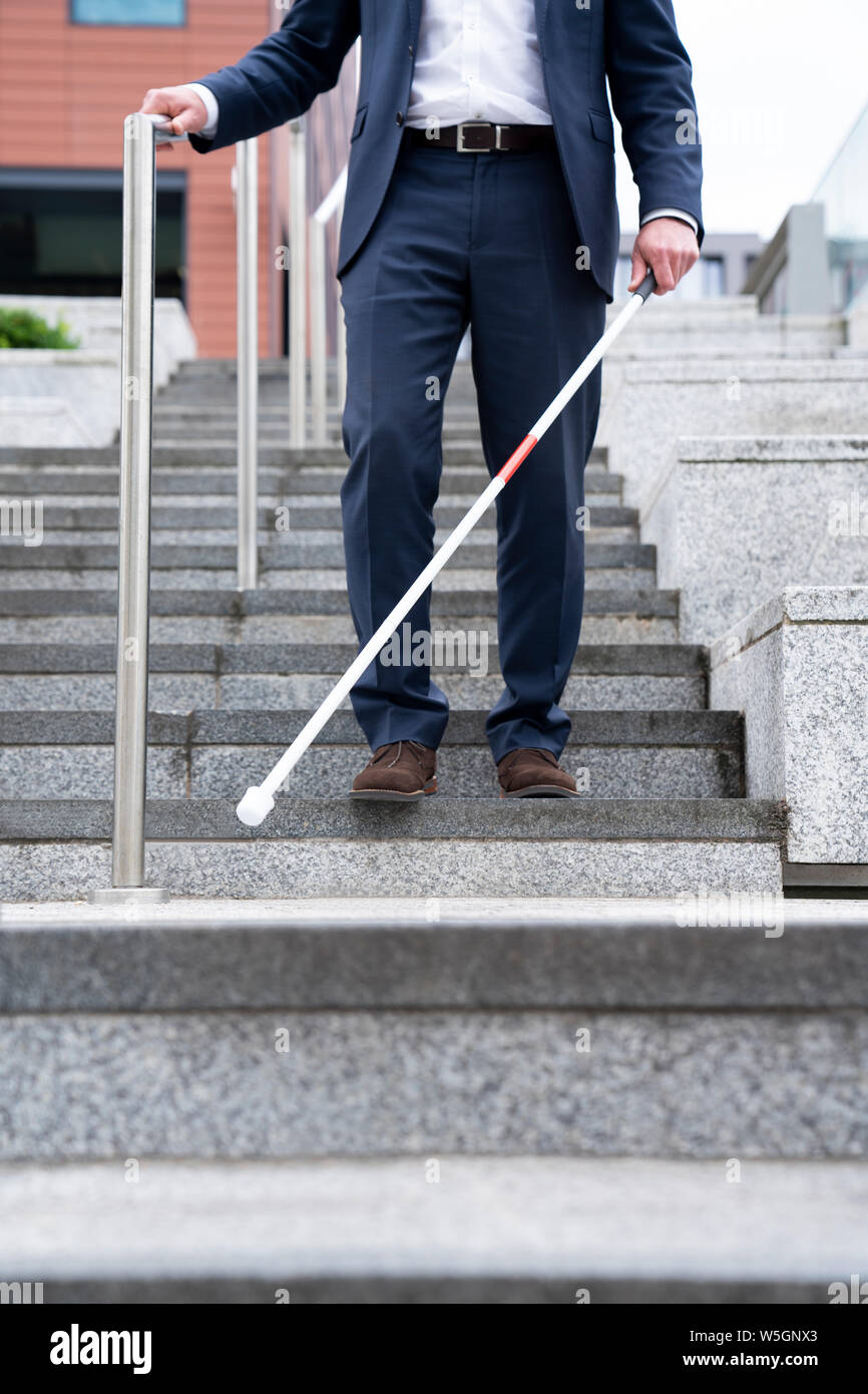 Blind man stick hi-res stock photography and images - Alamy