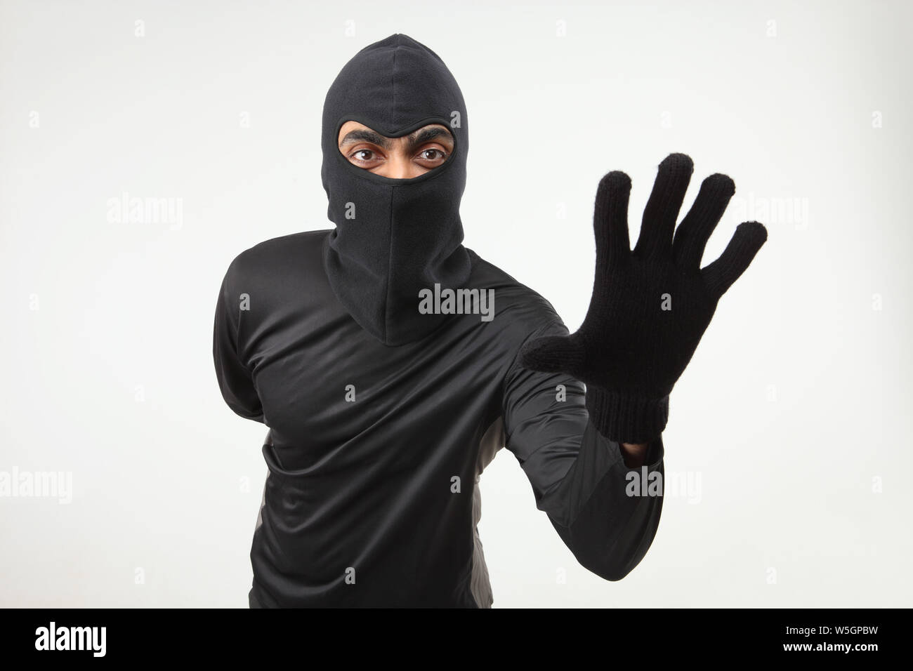 Portrait of a thief Stock Photo - Alamy