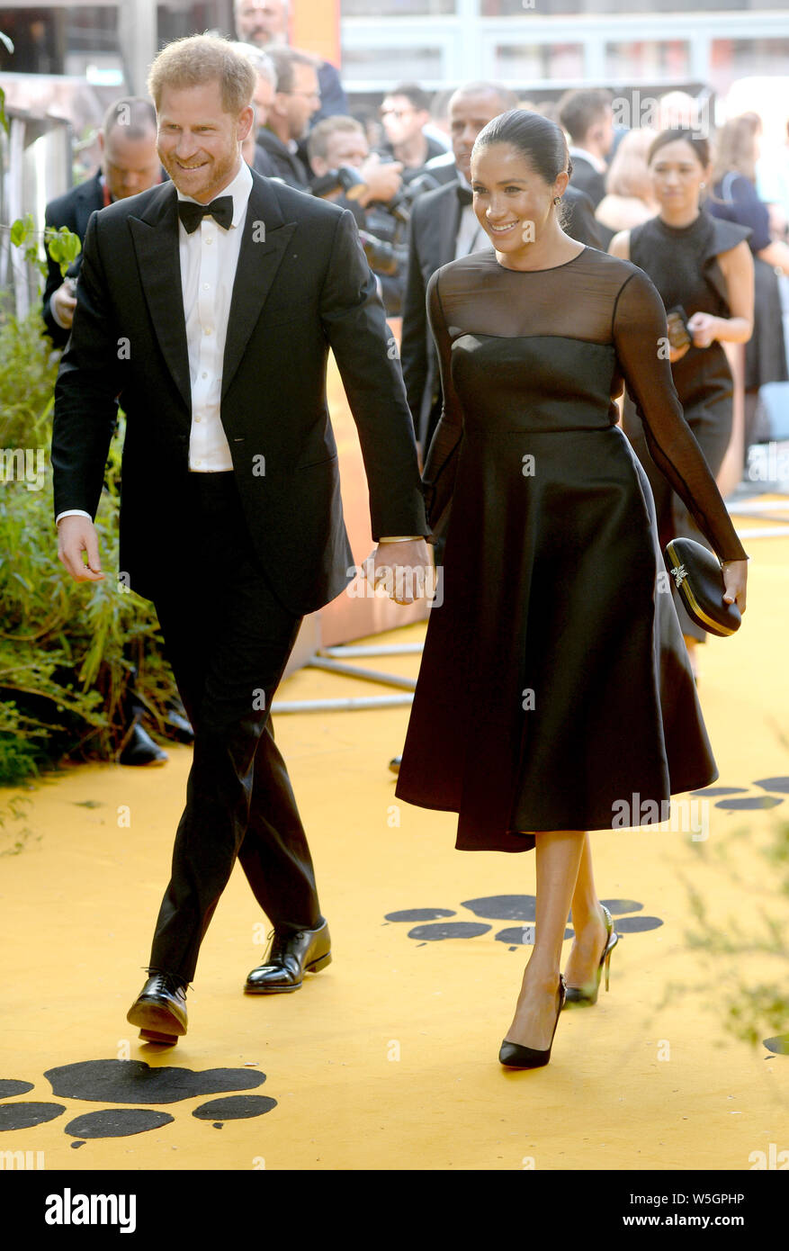 Photo Must Be Credited ©Alpha Press 078237 14/07/2019 Prince Harry Duke Of Sussex and Meghan Markle Duchess Of Sussex The Lion King European Premiere London Stock Photo