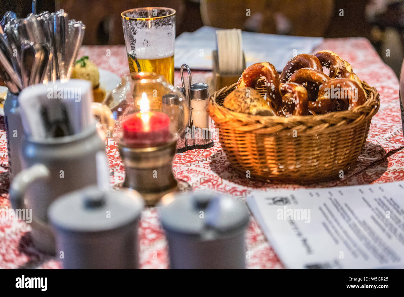 Pretzel and beer at night in Munich, Germany Stock Photo Alamy