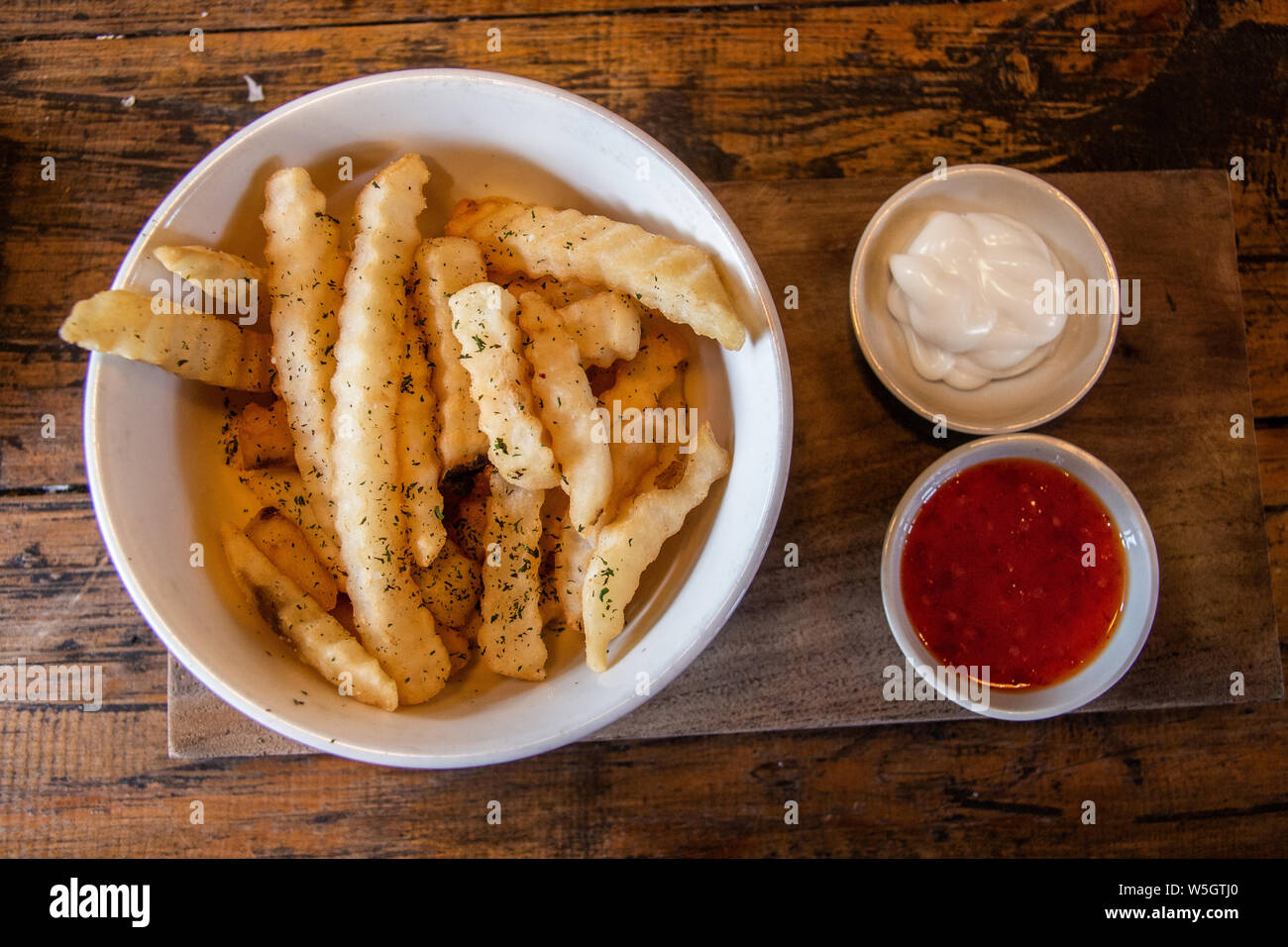 french fries and gravy. delicious fries Stock Photo Alamy