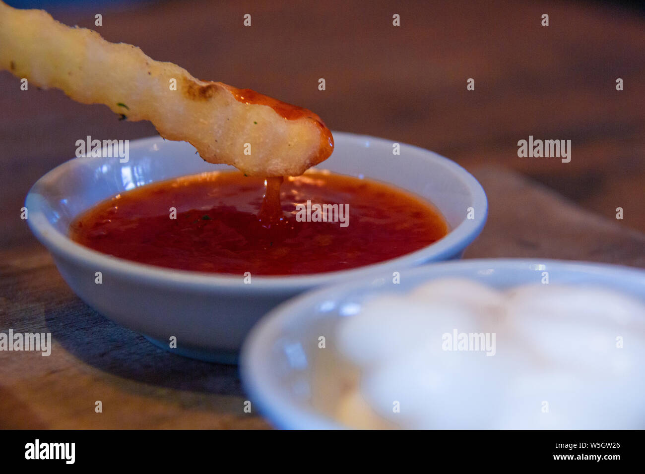 french fries and gravy. delicious fries Stock Photo Alamy