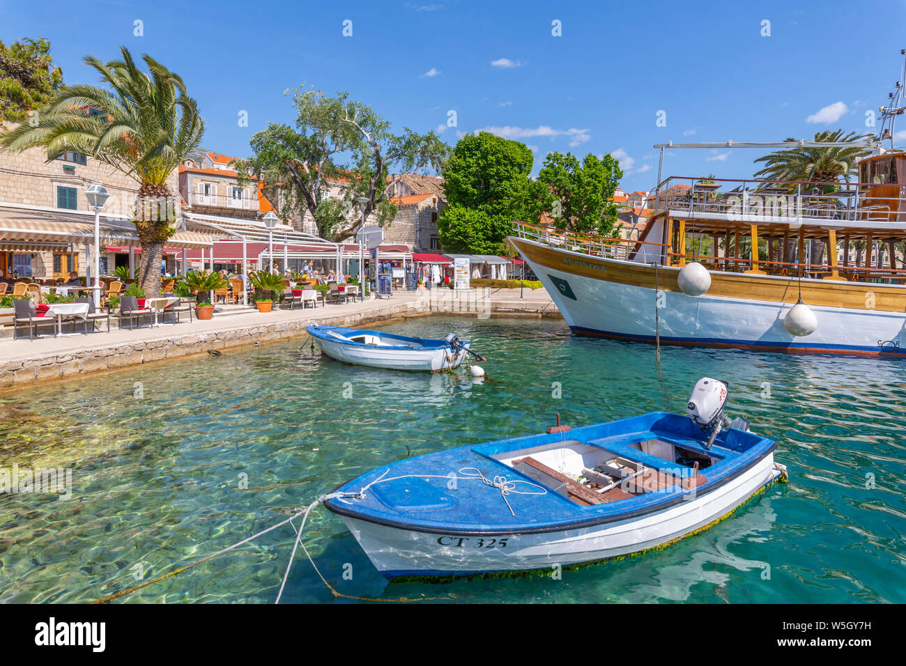 View of harbourside restaurants in Cavtat on the Adriatic Sea, Cavtat, Dubrovnik Riviera, Croatia, Europe Stock Photo