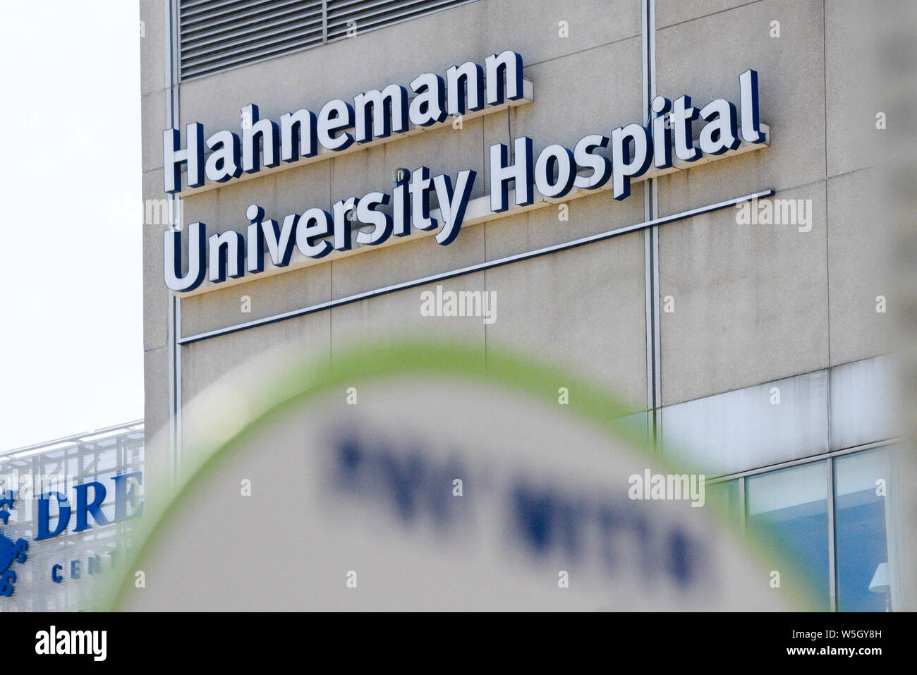 A view of the now shuttered Hahnemann University Hospital with Drexel University visible. Stock Photo
