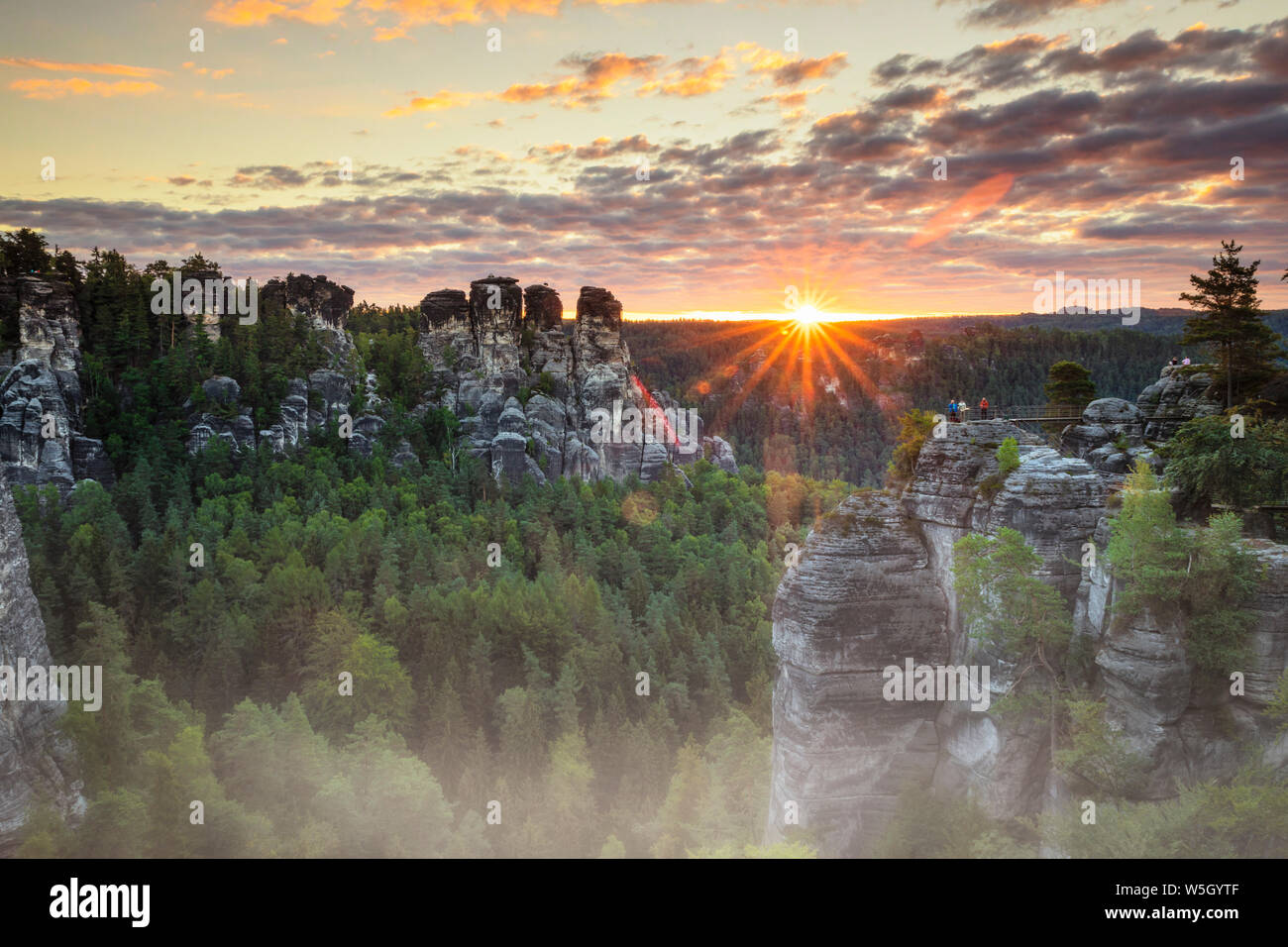 Bastei Rocks at sunrise, Elbsandstein Mountains, Saxony Switzerland National Park, Saxony, Germany, Europe Stock Photo