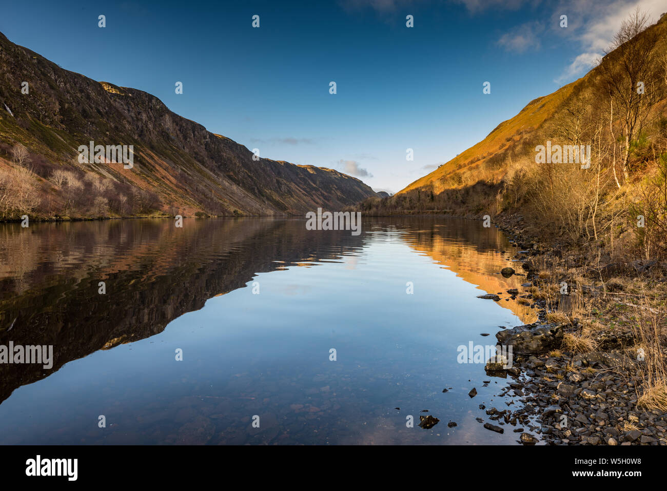 Early morning sunlight hits the waters of Loch Awe, Highlands, Scotland