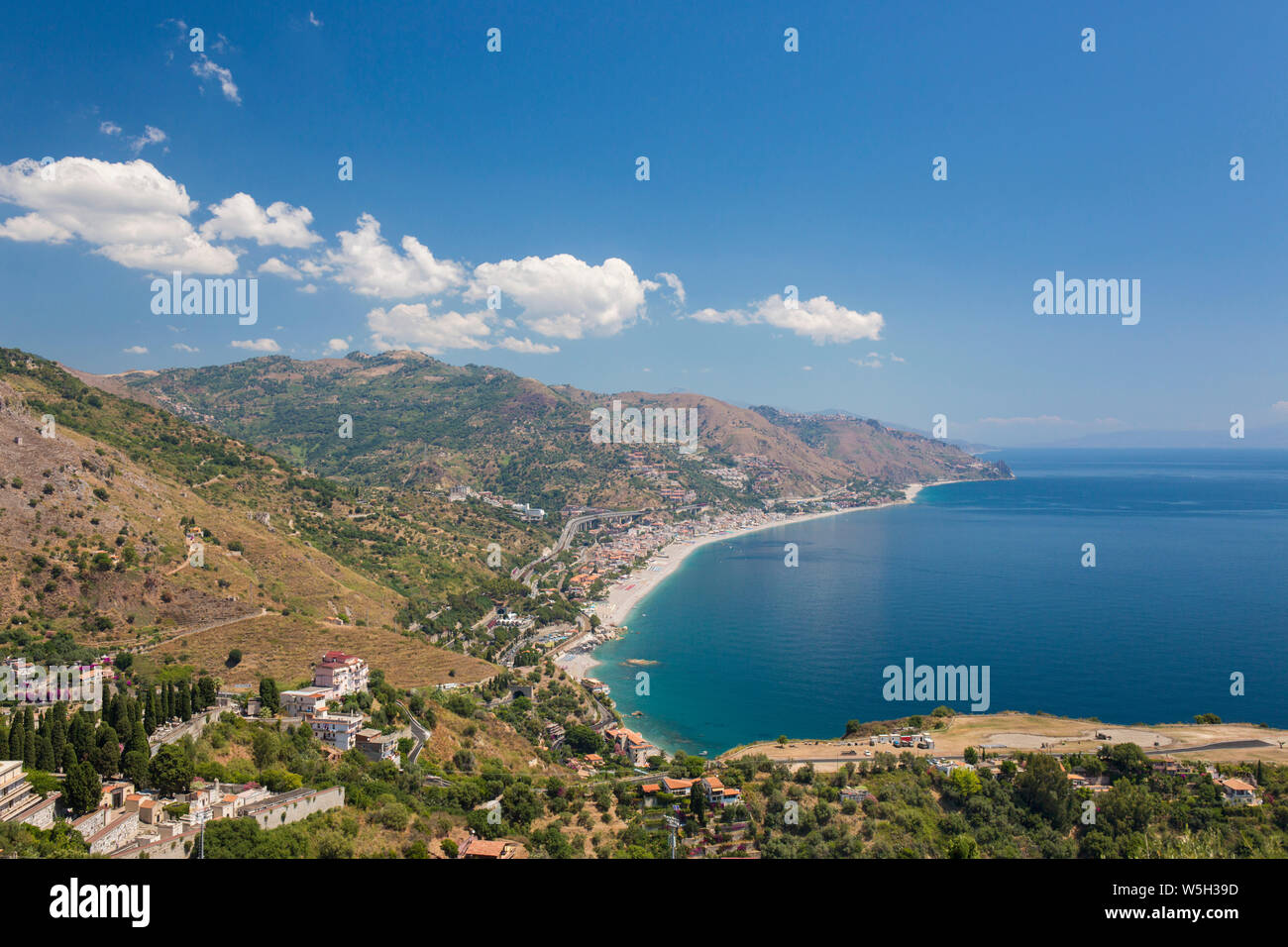View from the Greek Theatre to the Ionian Sea beach resorts of Mazzeo and Letojanni, Taormina, Messina, Sicily, Italy, Mediterranean, Europe Stock Photo