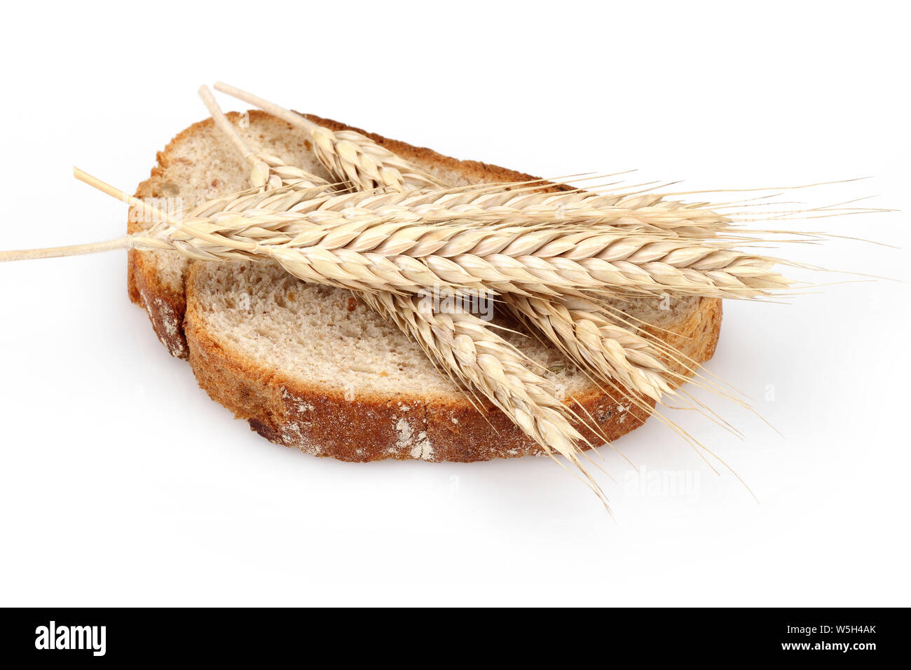 Bread slice and wheat ears isolated on white background Stock Photo - Alamy