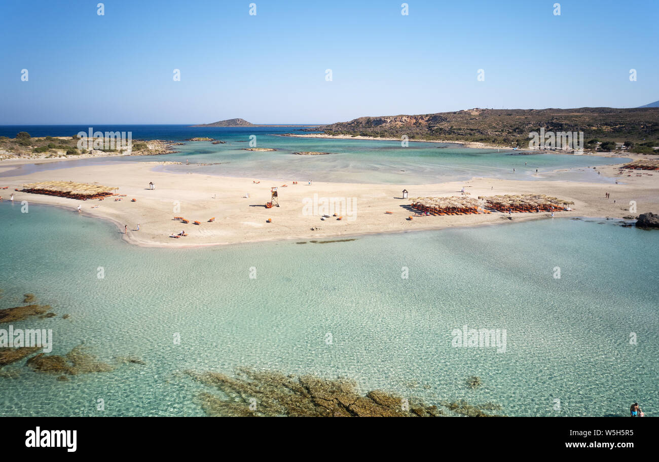 Aerial bird's-eye view from drone on Elafonisi sandy beach on Crete. Elafonissi is one of the most known world beaches and is famous for pink sand. Ki Stock Photo