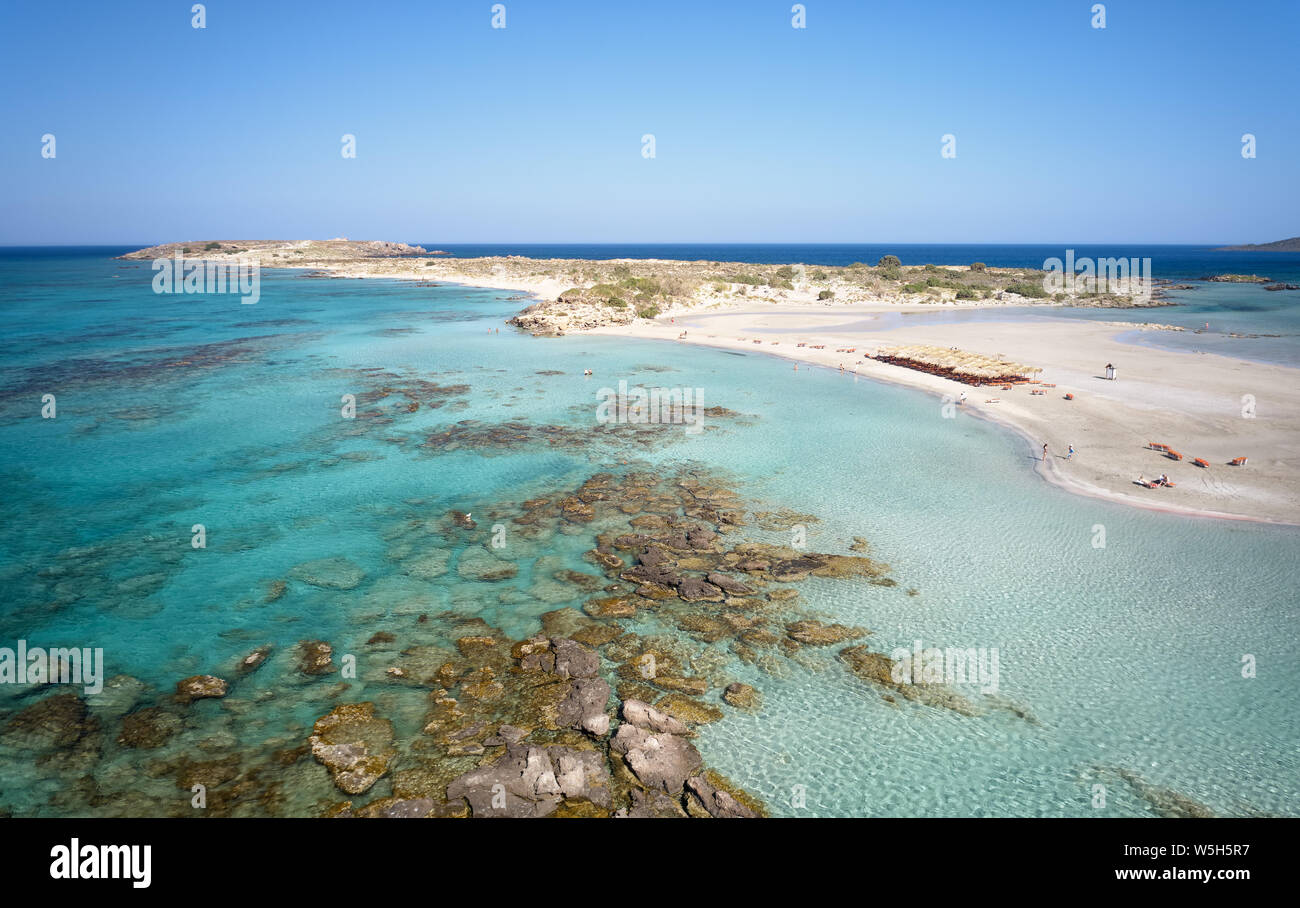 Aerial bird's-eye view from drone on Elafonisi sandy beach on Crete. Elafonissi is one of the most known world beaches and is famous for pink sand. Ki Stock Photo