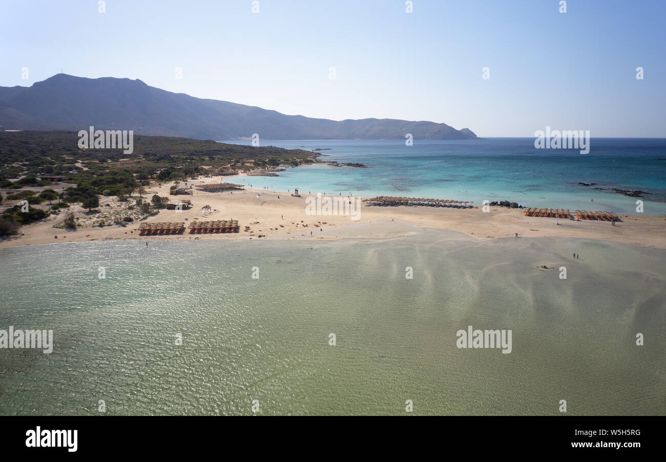 Aerial bird's-eye view from drone on Elafonisi sandy beach on Crete. Elafonissi is one of the most known world beaches and is famous for pink sand. Ki Stock Photo