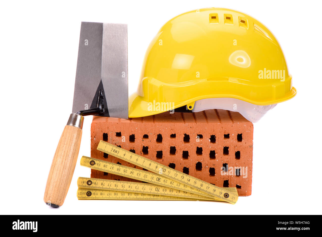 brick and tools for house construction Stock Photo